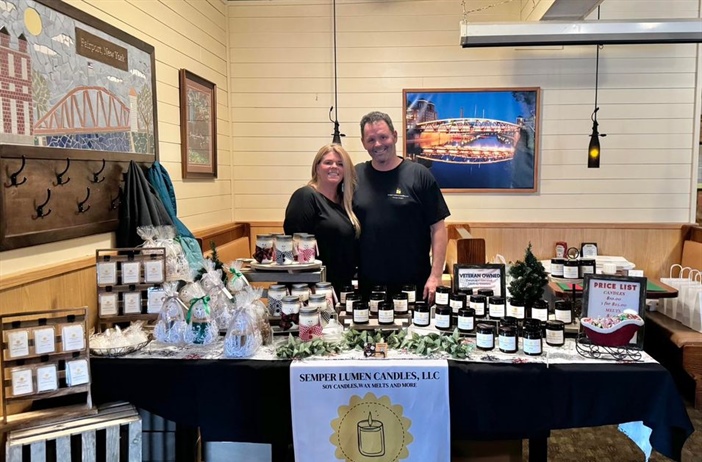 Semper Lumen Candles, LLC is all set up in the dining room! They have hand painted snowmen candles and ornaments too!! So cute!